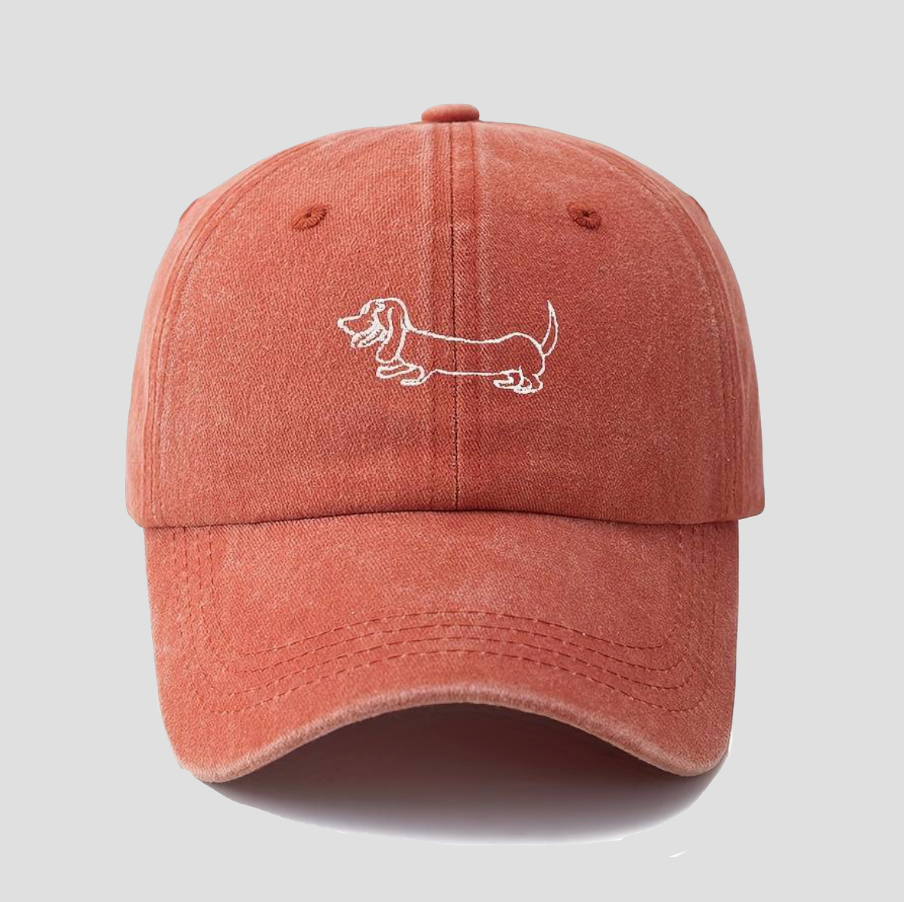 Orangene Baseball-Cap mit Dackel Stickerei
