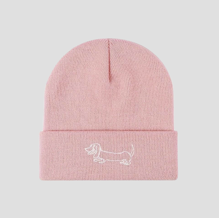 Pink knitted hat with dachshund embroidery