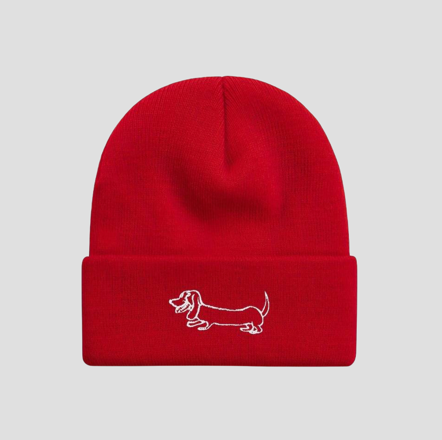 Red knitted hat with dachshund embroidery