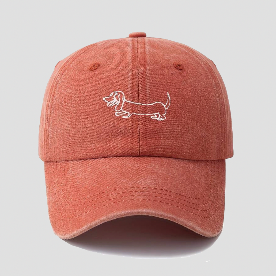 Orange baseball cap with dachshund embroidery